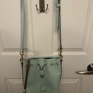 Green Crossbody Bag with Gold Hardware and Drawstring Closure